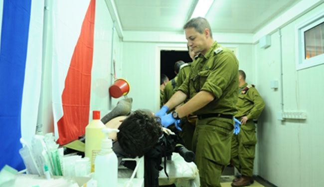 مئات المسلحين السوريين يعالجون بمستشفيات الکیان الاسرائیلي