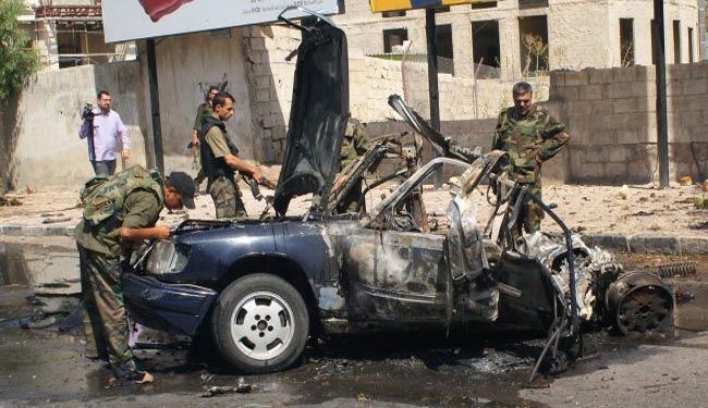 At least 40 killed in twin car blasts near Damascus