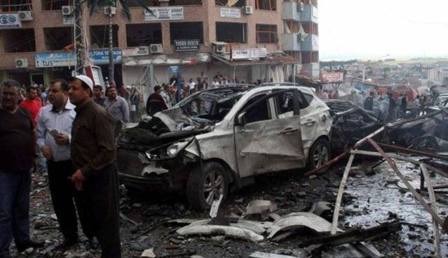 عشرات القتلى والجرحى بتفجير سيارة مفخخة بريف حمص