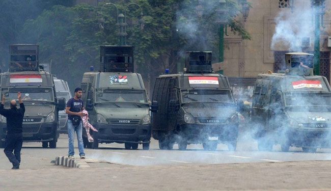 الشرطة تفرق تظاهرة لانصار مرسي في ميدان التحرير