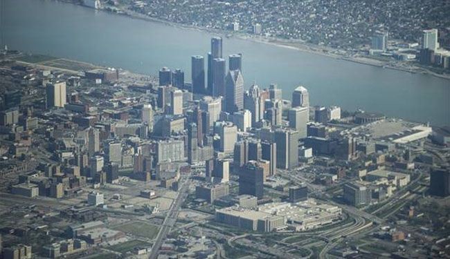 Judge lets Detroit to mark largest bankruptcy in US history