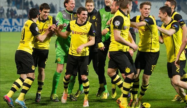 دورتموند وارسنال يتأهلان ونابولي يودع