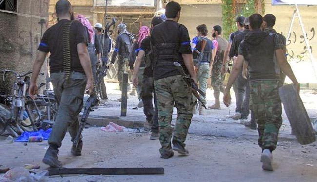المسلحون  يمنعون قافلة مساعدات من دخولها مخيم اليرموك