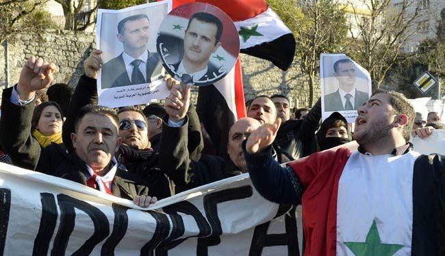 Pro-Assad rally held outside Geneva II Confab