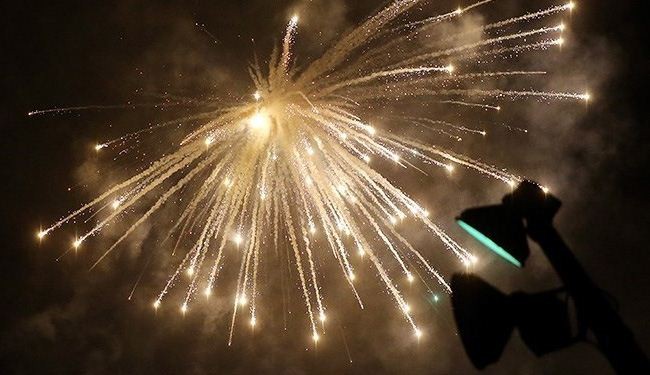 In picture: Iranians celebrate Revolution victory with fireworks