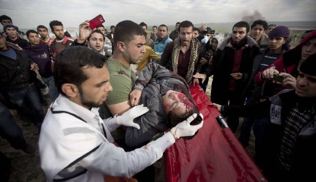 اصابة 10 فلسطينيين بالرصاص جيش الاحتلال الاسرائيلي بغزة