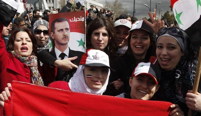 Syrians stage pro-government rally