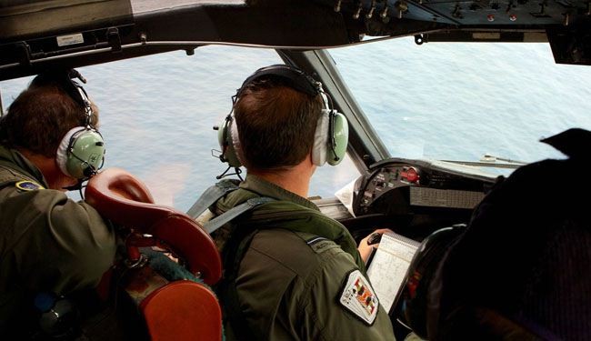 Bad weather forecast as new images spur MH370 search