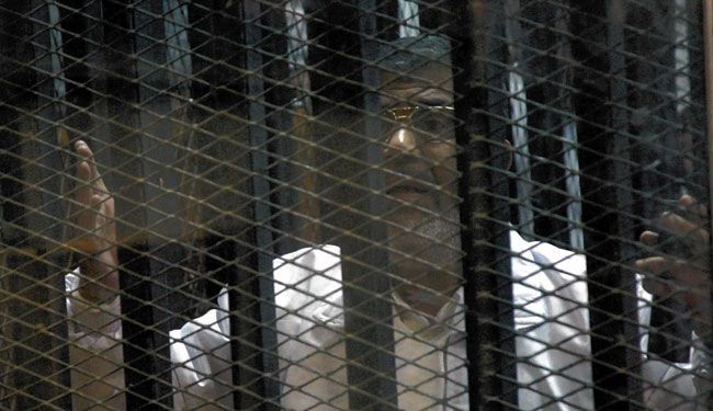 Morsi's trial on murder charges adjourns amid objection