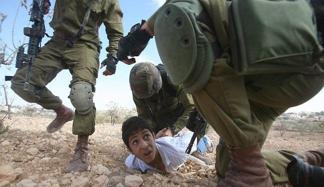 Israeli soldiers beat, chain Palestinian child