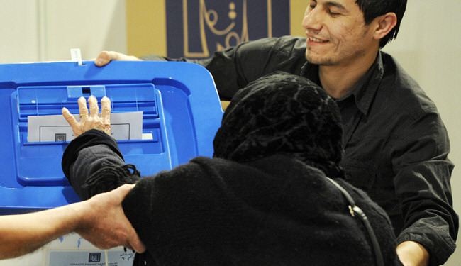 العراقیون فی ایران یشارکون فی الانتخابات التشریعیة لبلادهم