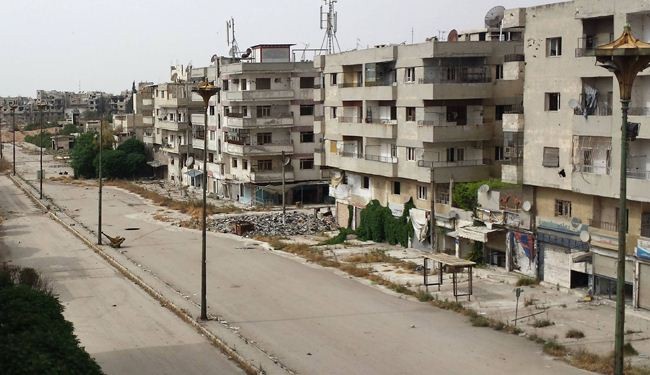 Syrian militants surrender strongholds in Homs