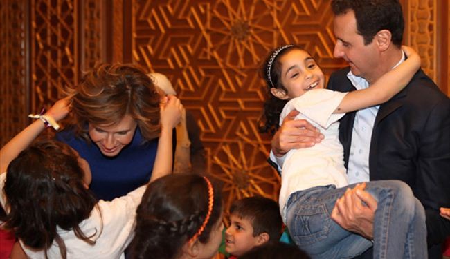 Syria's Assad, his wife Asma greet martyrs children: Photos