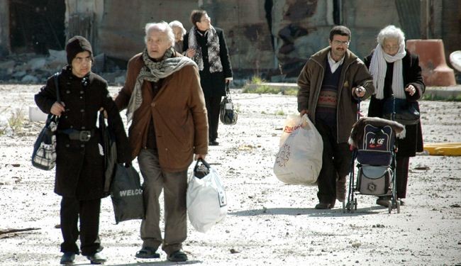 Syria civilians start returning to Homs' Old City