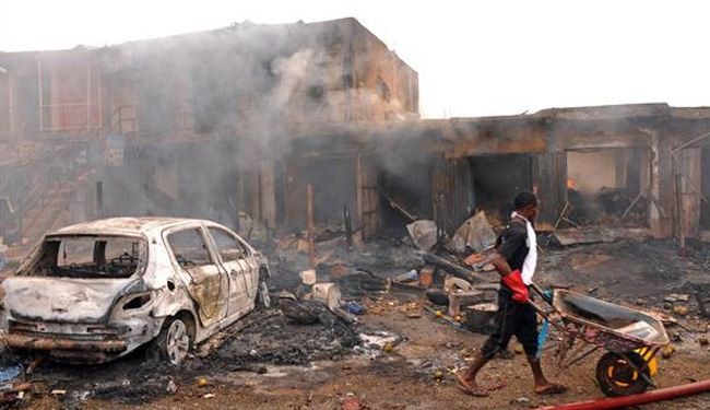 Nearly 120 killed in twin Nigeria car bombs