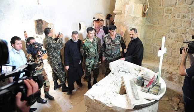 بالصور: الجيش السوري يرمم تمثالا للسيدة مريم (ع)