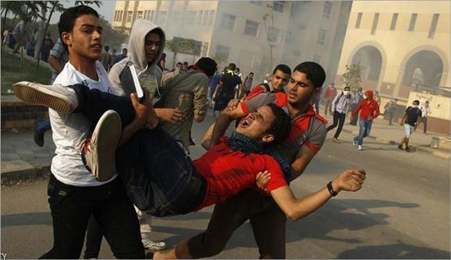 الشرطة تفرق مسيرة طلاب مؤيدين لمرسي بالغاز المسيل للدموع
