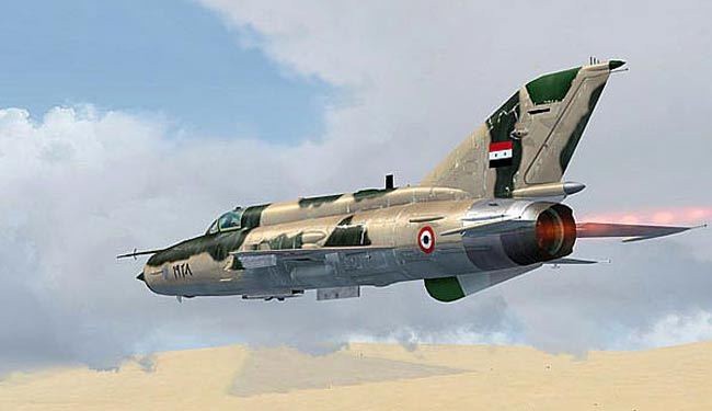سلاح الجو السوري يقصف مقار داعش بالرقة والحسكة