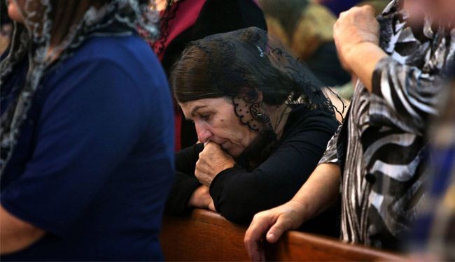 علماء العراق والوقف الشيعي ينددان تهجير مسيحيي الموصل
