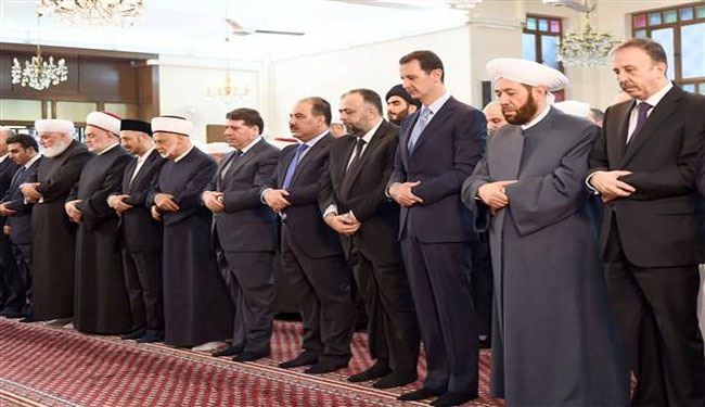 Assad attends Eid al-Fitr prayers in Damascus mosque