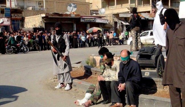 ISIL militants execute seven members of a Syrian family