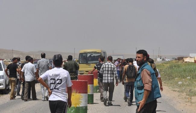 1000's of Iraqis escape ISIL siege in Sinjar Mountain