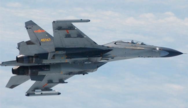 Washington warns China on aircraft interception