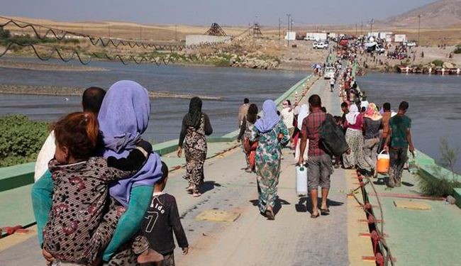 16,000 Iraqi Yazidis flee from ISIL attacks to Turkey
