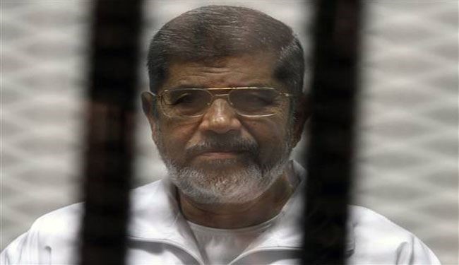 Morsi charged with leaking state secrets to Qatar, Al-Jazeera