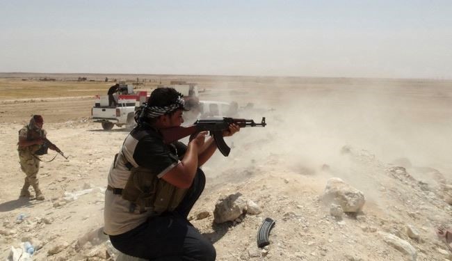 القوات العراقية والمتطوعين يقتلون عشرات الإرهابيين بالضلوعية