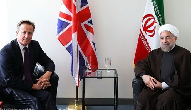 بالصور / روحاني يلتقي رئيس الوزراء البريطاني