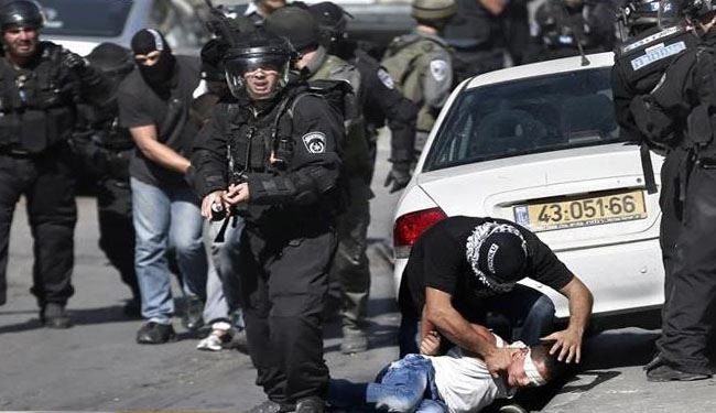 Israeli security forces arrest a young Palestinian during clashes after Friday prayer's.