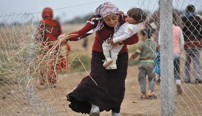 A Syrian Kurdish refugee woman from Kobani...