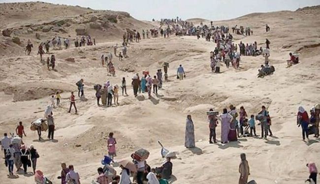 جرائم داعش: وفاة 18 طفلاً لسيرهم ساعات بالعراء غرب الرمادي