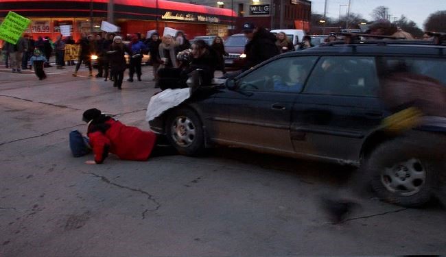 Hit-and-Run Driver Drags Woman 20 Feet Under his FRONT WHEEL in Ferguson Protest