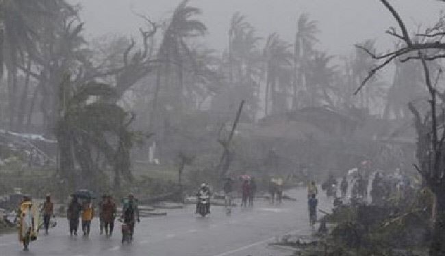 Typhoon Tears into Disaster-Weary Philippines
