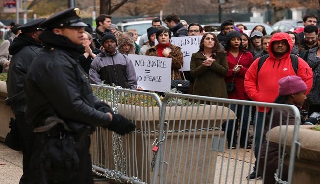 آلاف المتظاهرين في واشنطن ونيويورك احتجاجا على عنف الشرطة