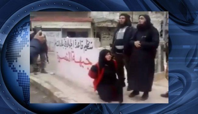 اعدام زن سوری به دست مفتی بی بند و بار النصره + عکس