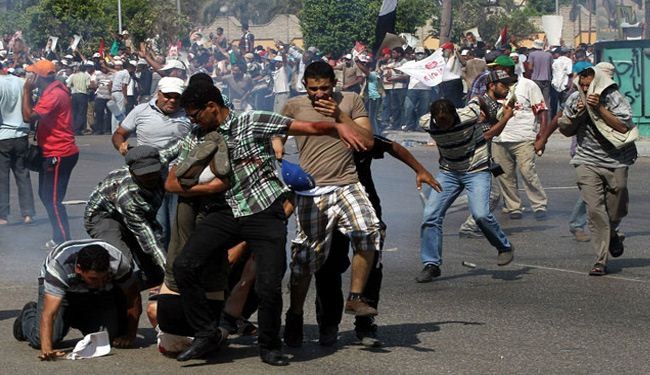 اشتباكات دامية بذكرى الثورة المصرية تخلف 18 قتيلا+صور