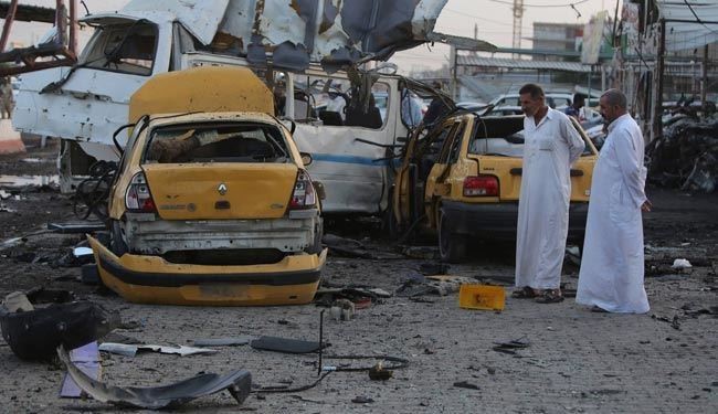 Suicide Bomber Kills at least 12 in north Baghdad