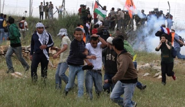 فلسطينيون يحيون الذكرى العاشرة لتظاهرة بلعين ضد الجدار والاستيطان