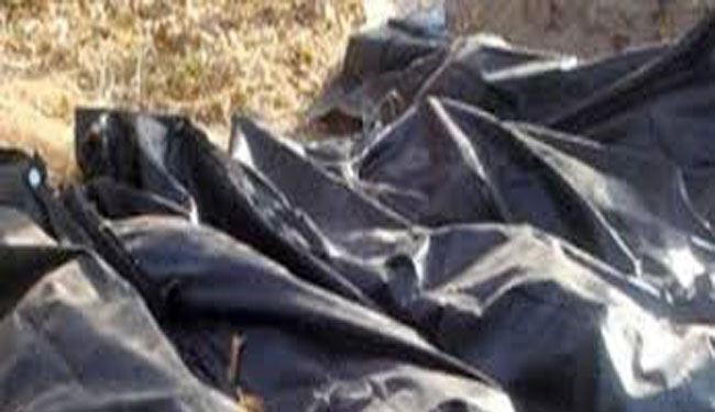 20 Bodies Dressed in Red Found in Grave in Tikrit