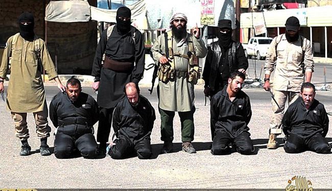 Shocking Images; ISIS Beheads 4 More Iraqis as “Spy”