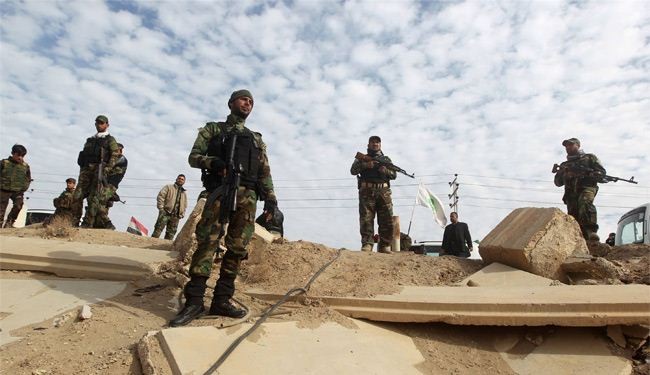 القوات العراقية تحرر منطقة العنكور جنوب الرمادي من 
