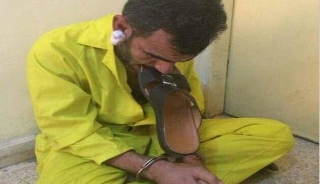 Pics: ISIS Terrorist Humiliated on TV, Forced to Chew a Sandal