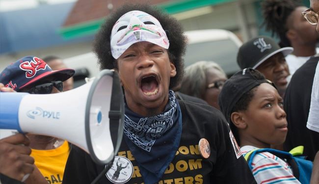 Protesters Take to Ferguson Streets to Mark Anniversary of Brown Killing