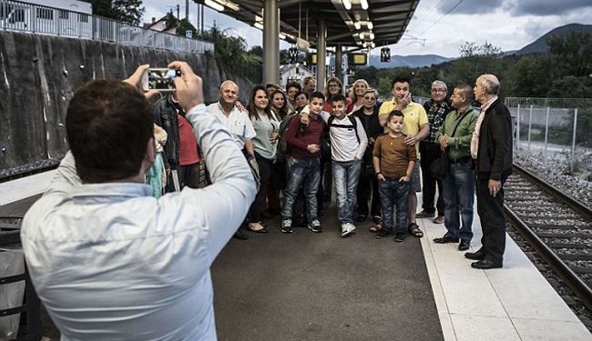 Pics: Iraqi Migrant Family Arrive in France, Fleeing from ISIS