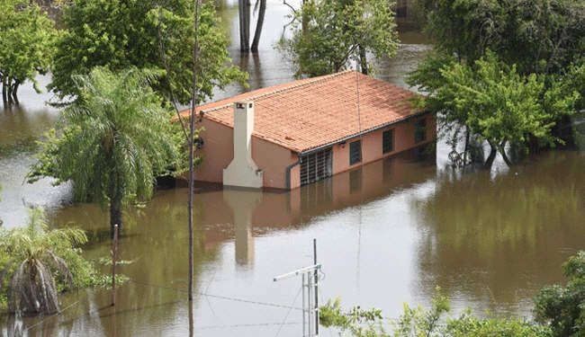 الفيضانات تجلي اكثر من 160 الف شخص في اميركا اللاتينية