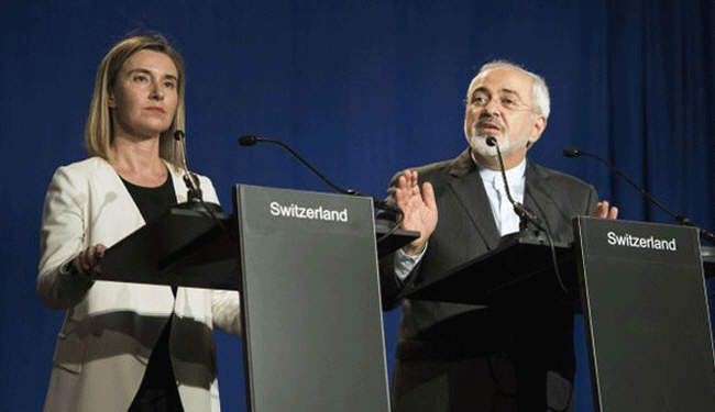 ظريف وموغريني يعلنان بدء تنفيذ التفاهم النووي ورفع الحظر عن إيران