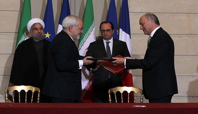 إيران وفرنسا ترسمان خارطة التعاون بينهما عبر توقيع 20 وثيقة